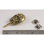 A handcrafted Horseshoe Crab Pin next to a ruler, available for sale at Creativeartisan.com - the image offers a sense of scale