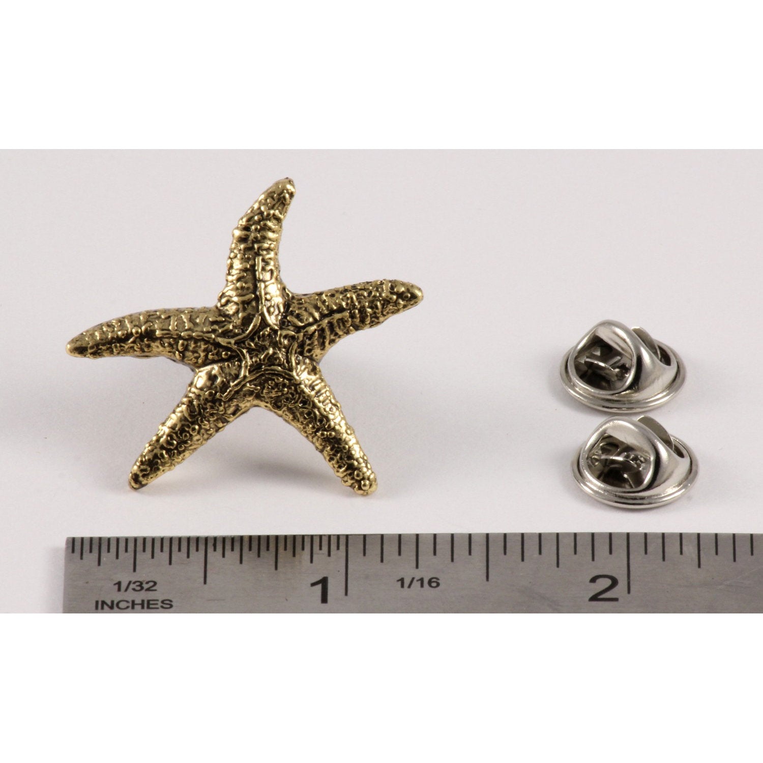 A handcrafted Star Great Job Pin next to a ruler, available for sale at Creativeartisan.com - the image offers a sense of scale