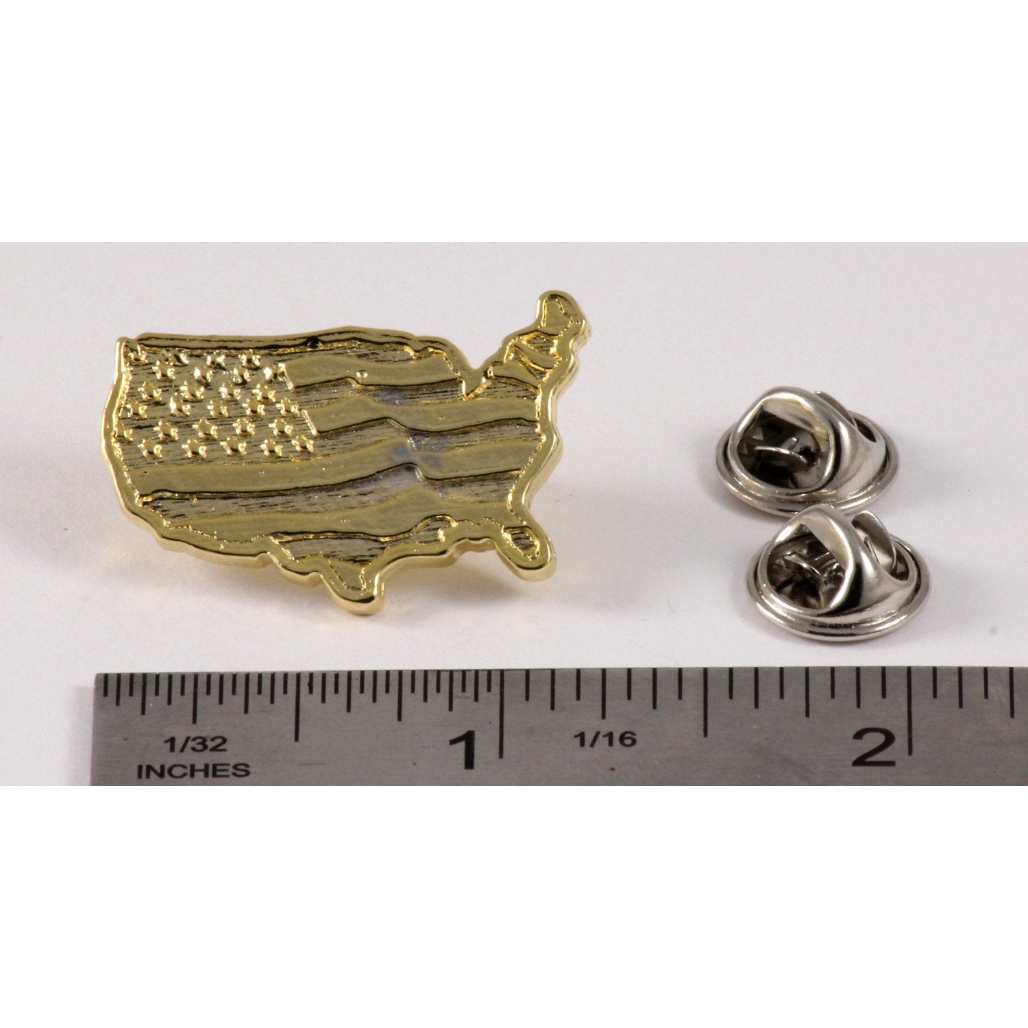 A handcrafted American Flag In Usa Outline Large Pin next to a ruler, available for sale at Creativeartisan.com - the image offers a sense of scale