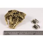 A handcrafted Saber Toothed Cat Skull Pin next to a ruler, available for sale at Creativeartisan.com - the image offers a sense of scale