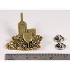 A handcrafted White Wine Bottle Glass Pin next to a ruler, available for sale at Creativeartisan.com - the image offers a sense of scale