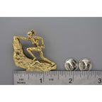 A handcrafted Rock Climber Female Pin next to a ruler, available for sale at Creativeartisan.com - the image offers a sense of scale