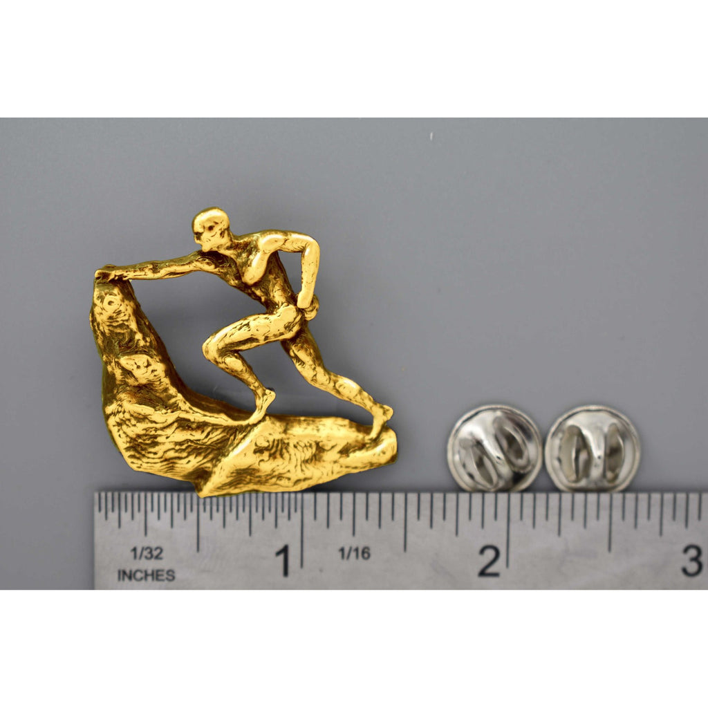 A handcrafted Rock Climber Male Pin next to a ruler, available for sale at Creativeartisan.com - the image offers a sense of scale