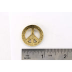 A handcrafted Peace Sign Plain Pin next to a ruler, available for sale at Creativeartisan.com - the image offers a sense of scale