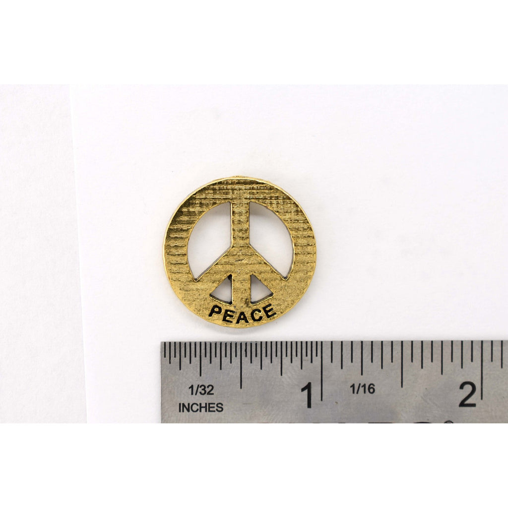 A handcrafted Peace Imprinted With Peace Pin next to a ruler, available for sale at Creativeartisan.com - the image offers a sense of scale