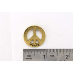 A handcrafted Peace Imprinted With Peace Pin next to a ruler, available for sale at Creativeartisan.com - the image offers a sense of scale