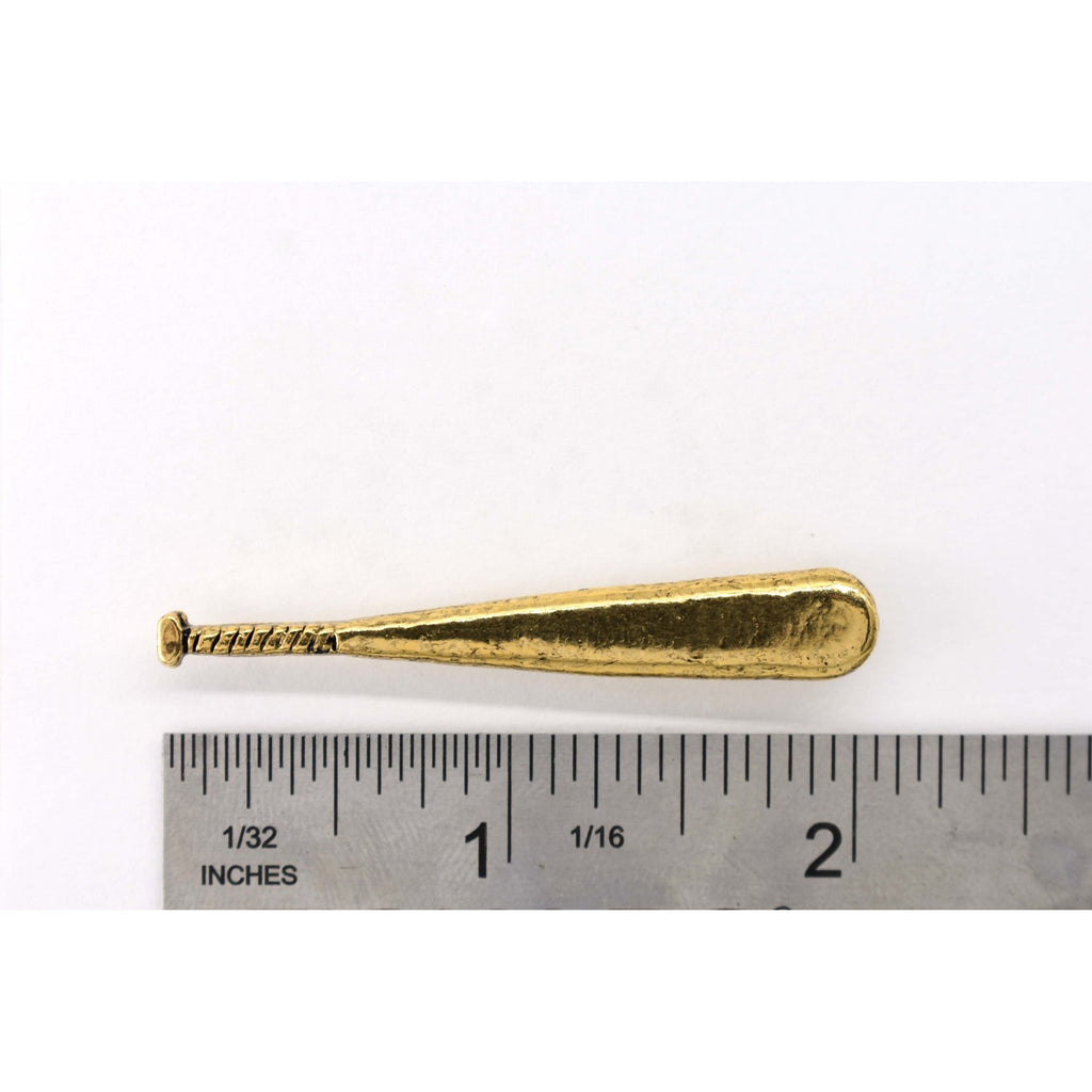 A handcrafted Baseball Bat Pin next to a ruler, available for sale at Creativeartisan.com - the image offers a sense of scale