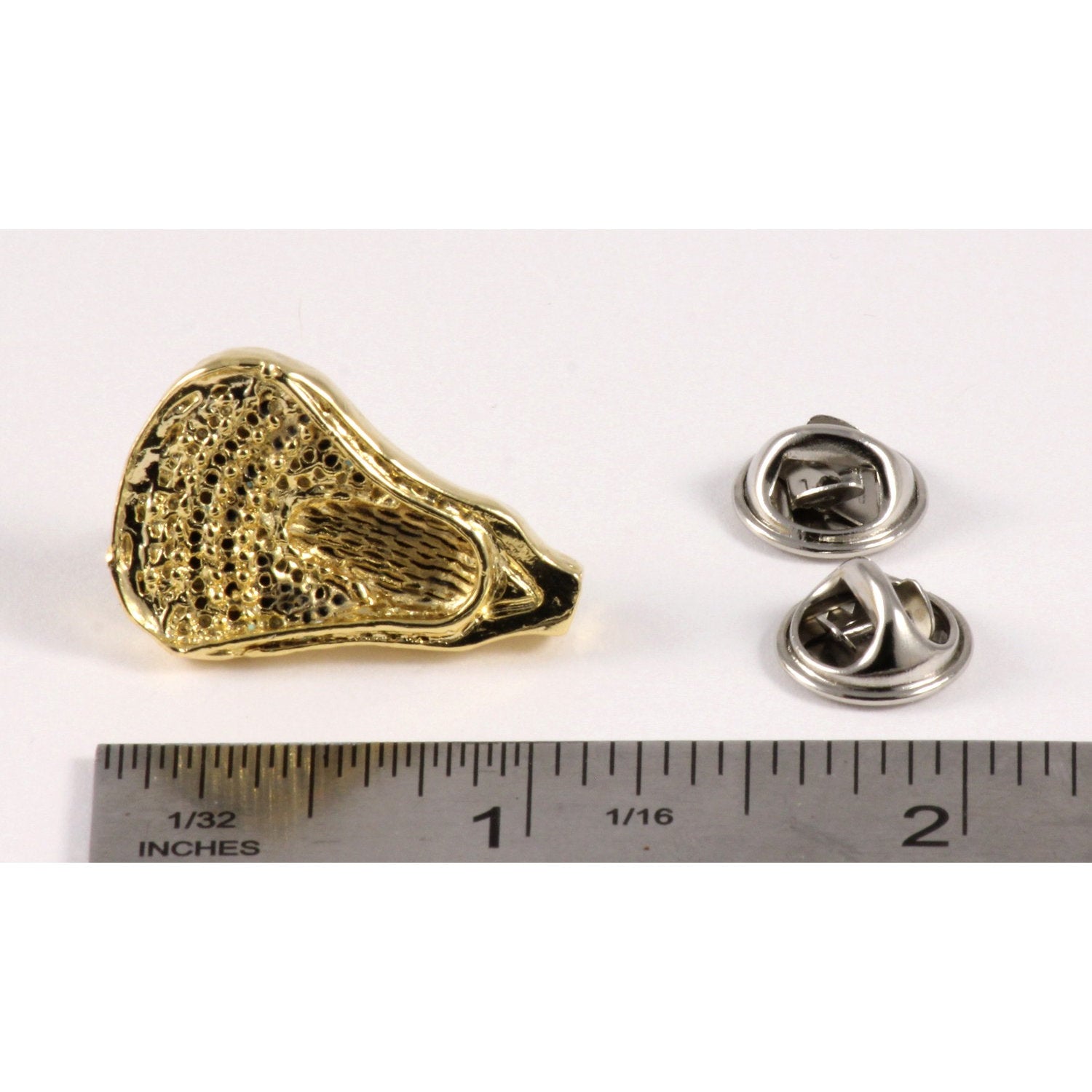 A handcrafted La Crosse Large Head Pin next to a ruler, available for sale at Creativeartisan.com - the image offers a sense of scale