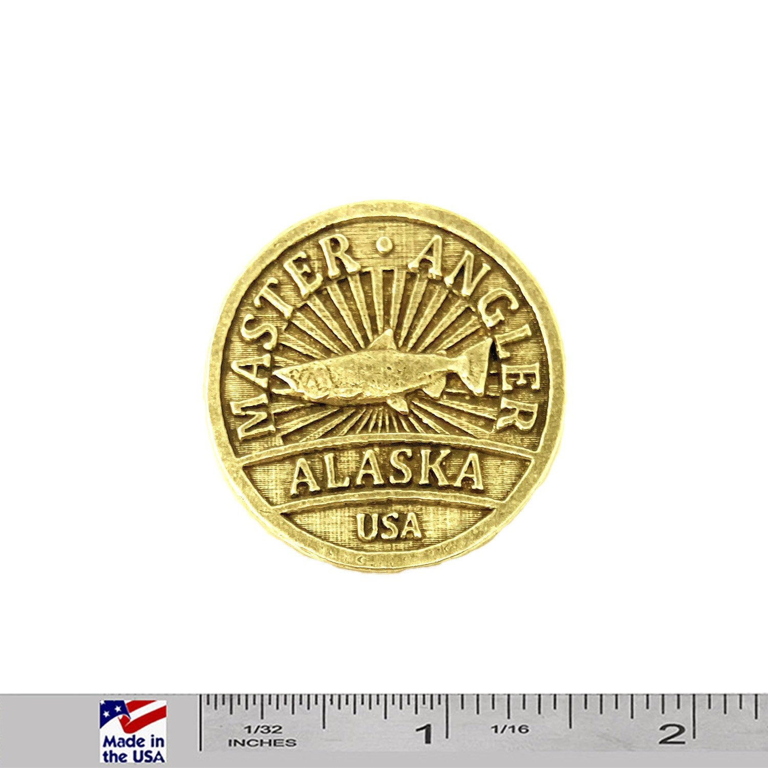 A handcrafted Alaska Master Angler Pin next to a ruler, available for sale at Creativeartisan.com - the image offers a sense of scale